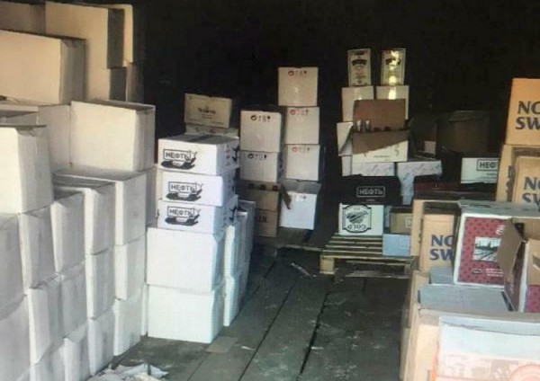 Тюменец в гараже хранил пять тысяч бутылок контрафактной водки, виски и коньяка 