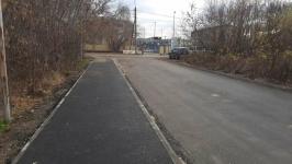 В микрорайоне Тура ремонтируют дороги и строят тротуары