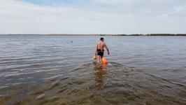 Тюменские "моржи" ныряли с гирями и автоматами в курганском озере Тюменские "моржи" ныряли с гирями и автоматами в курганском озере