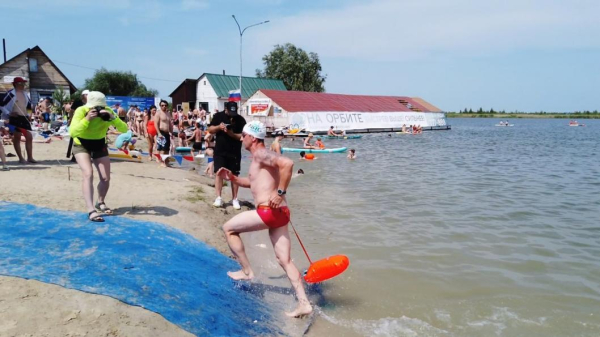Многонациональный фестиваль "Время побед" провели "моржи" Тюмени 